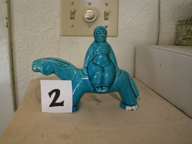 2.2 woman on horseturq.jpg